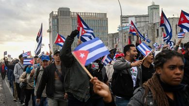 Cuban protest crowds facing security forces amid rising anti-government unrest