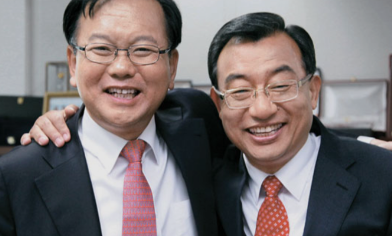 대구와 전남·광주를 배경으로 김부겸과 이정현이 서로 맞선 구도로 배치된 정치 상징 이미지